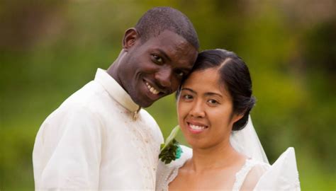 Black American marrying Filipina in the Philippines.